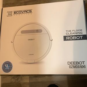 DEEBOT RECHARGEABLE FLOOR VACUUM AND MOP WITH ACCESSORIES.